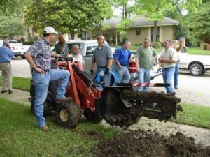 the Concord Irrigation Repair team installing a new line