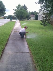 technician handles sprinkler repair in Concord CA